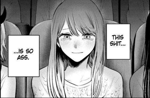 An edited screenshot from the Oshi No Ko manga. A girl is looking at the
viewer's direction while watching some kind of show. The speech bubbles around
her have been edited to say: This shit... is so ass.